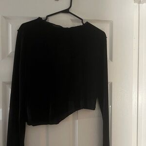 Long sleeved asymmetrical top